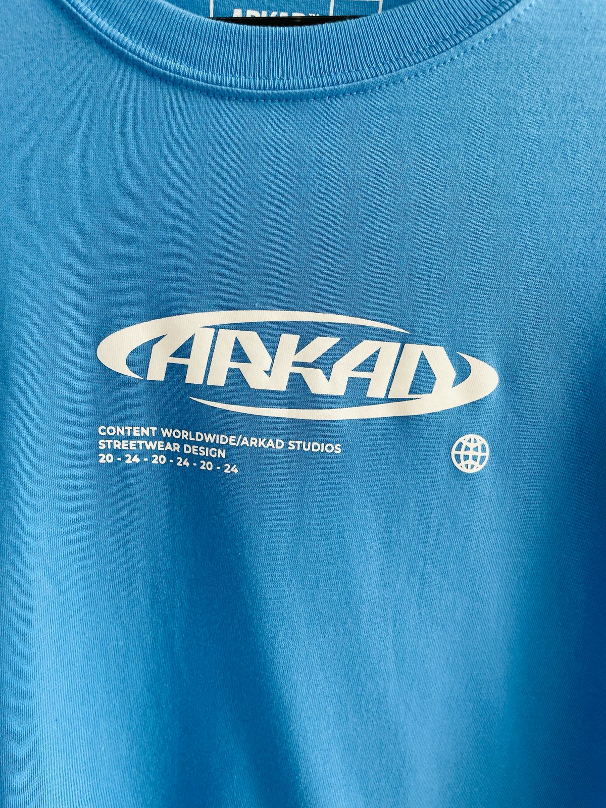 Polo ARKAD color azul / Logo pecho pequeño