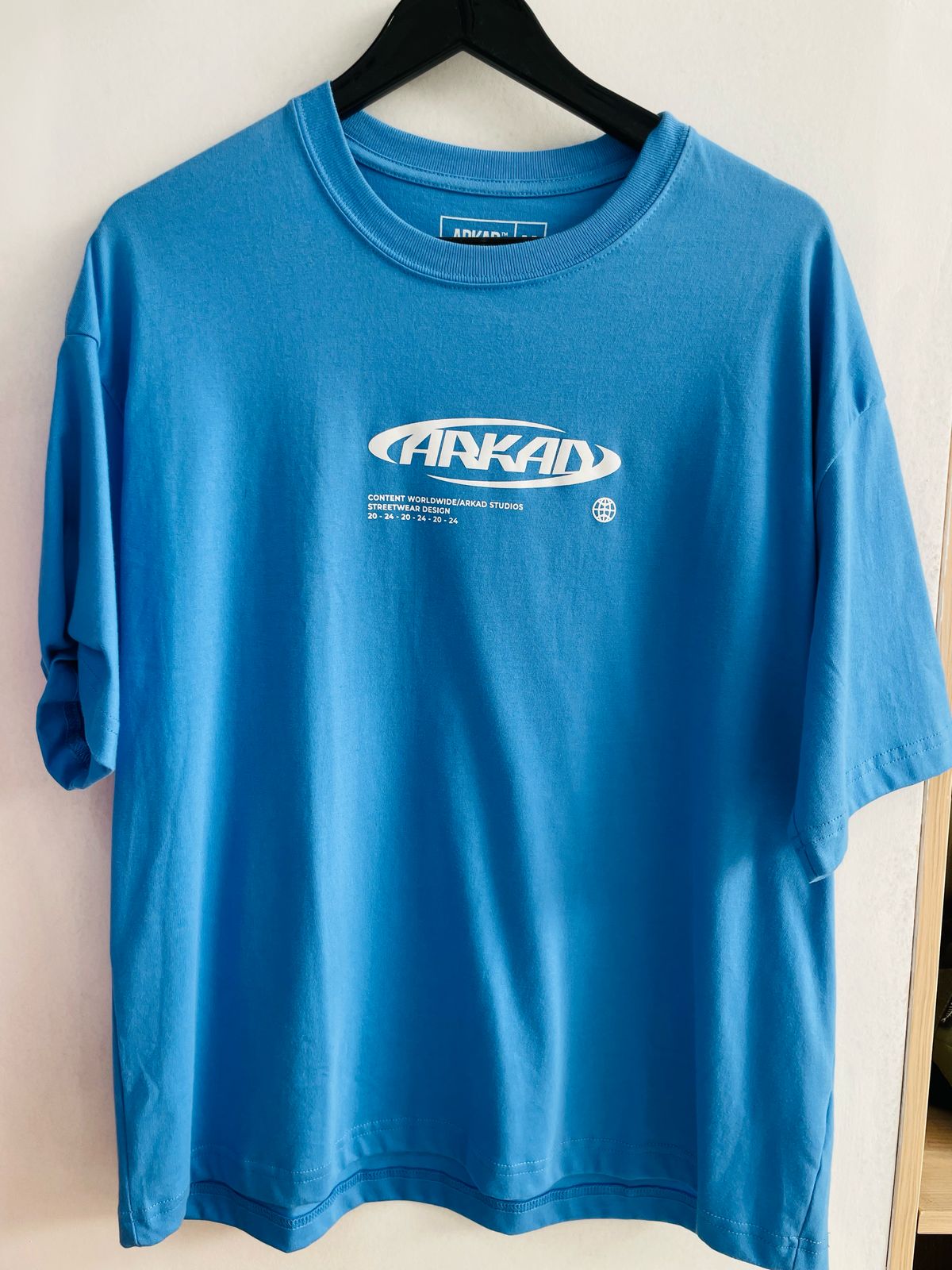 Polo ARKAD color azul / Logo pecho pequeño