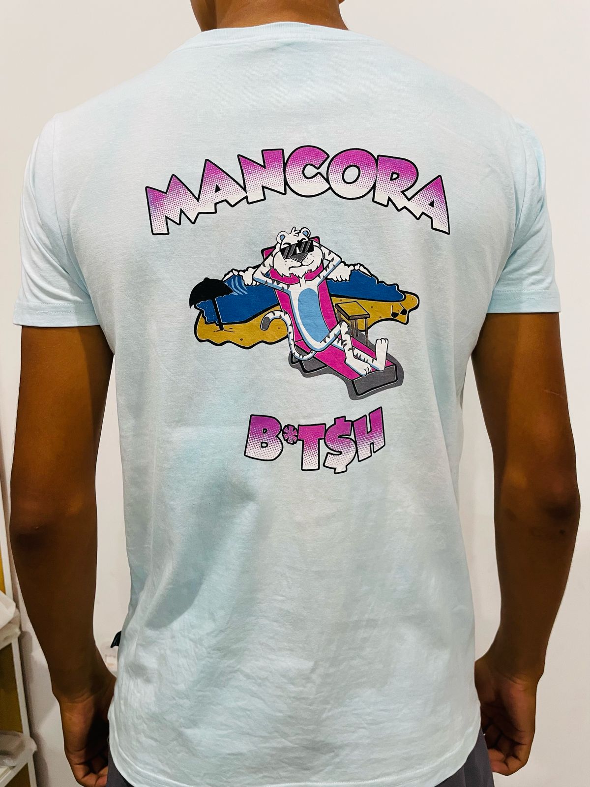 Polo Bultiger celeste / Logo pecho Rosa-Blanco