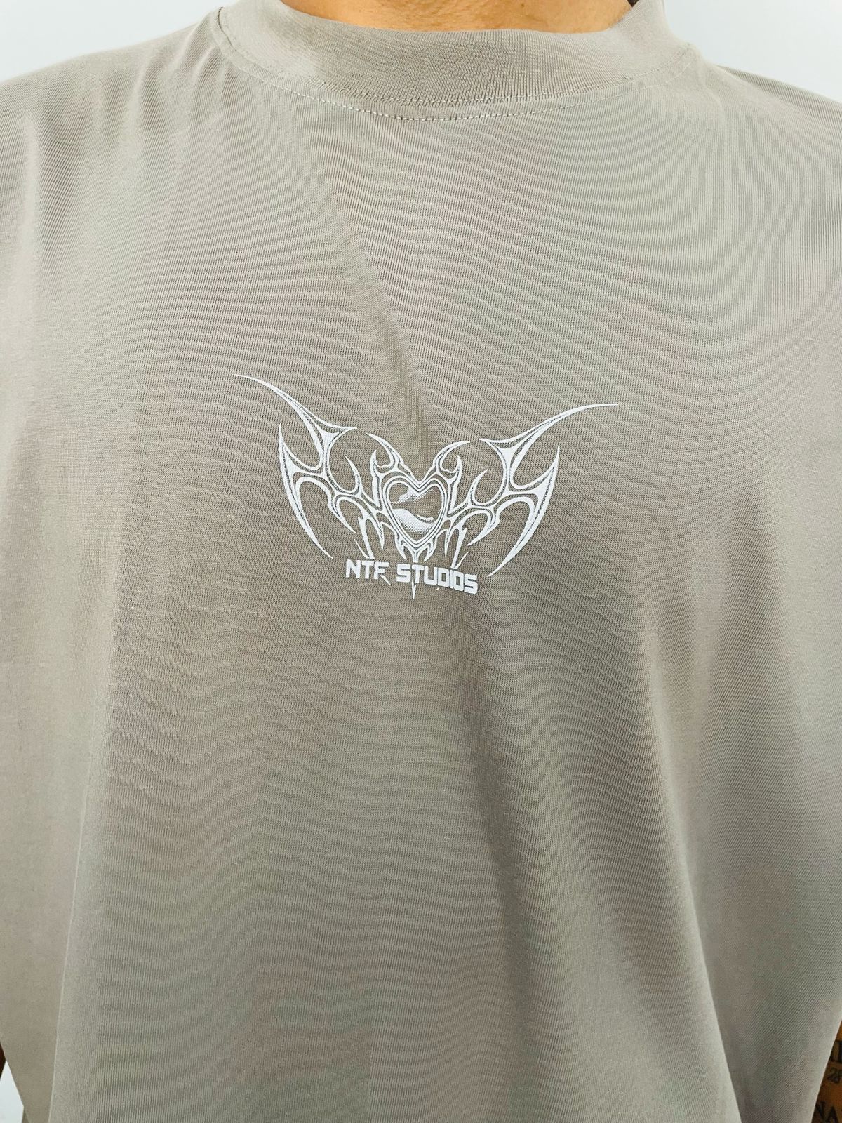 Polo Boxy Fit NTF color rata / Logo pecho corazon