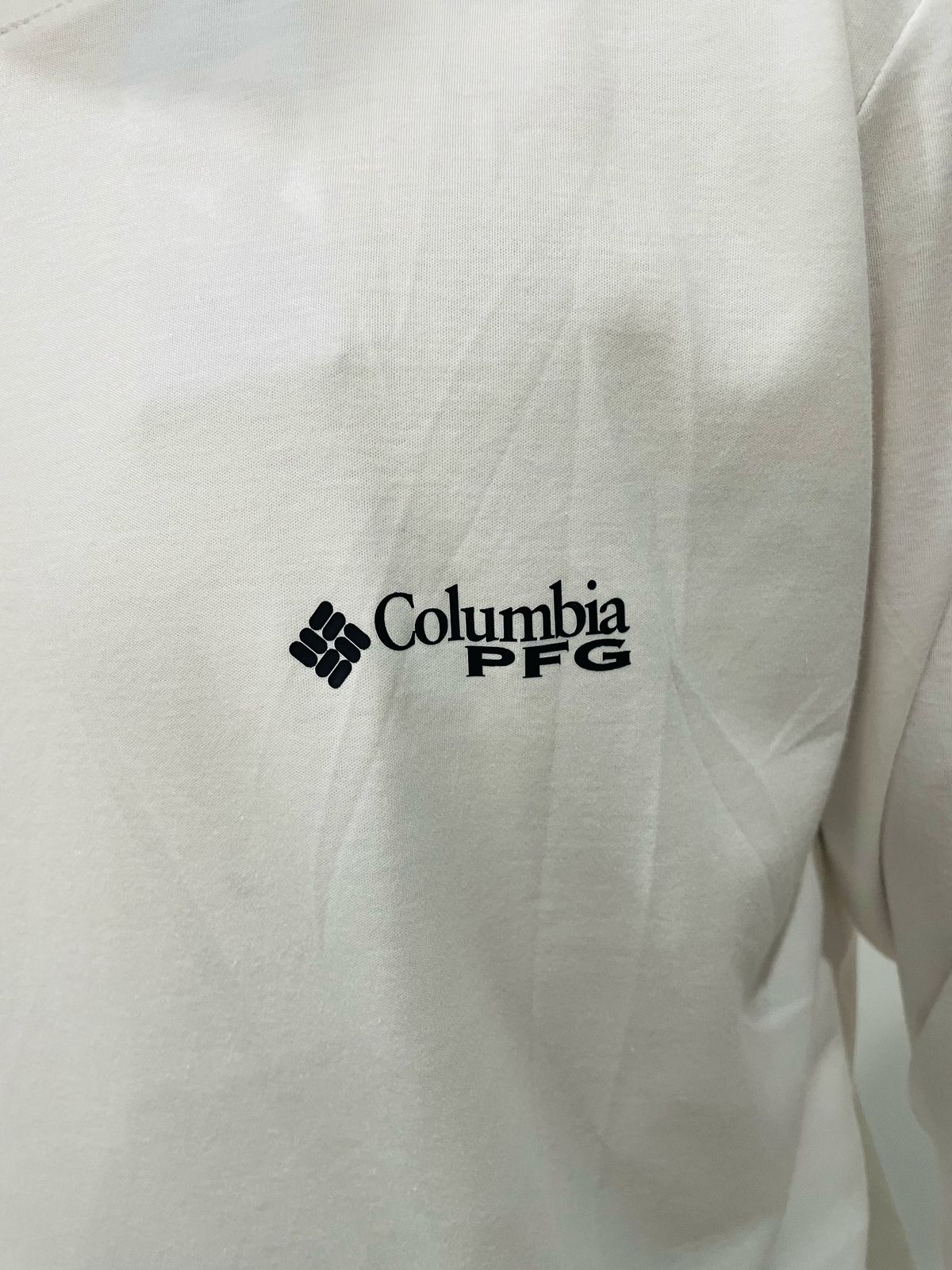 Polo manga larga Columbia blanco / Logo negro
