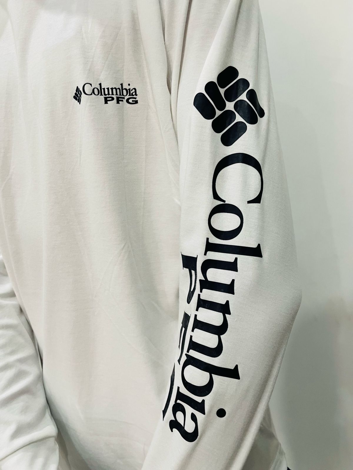 Polo manga larga Columbia blanco / Logo negro