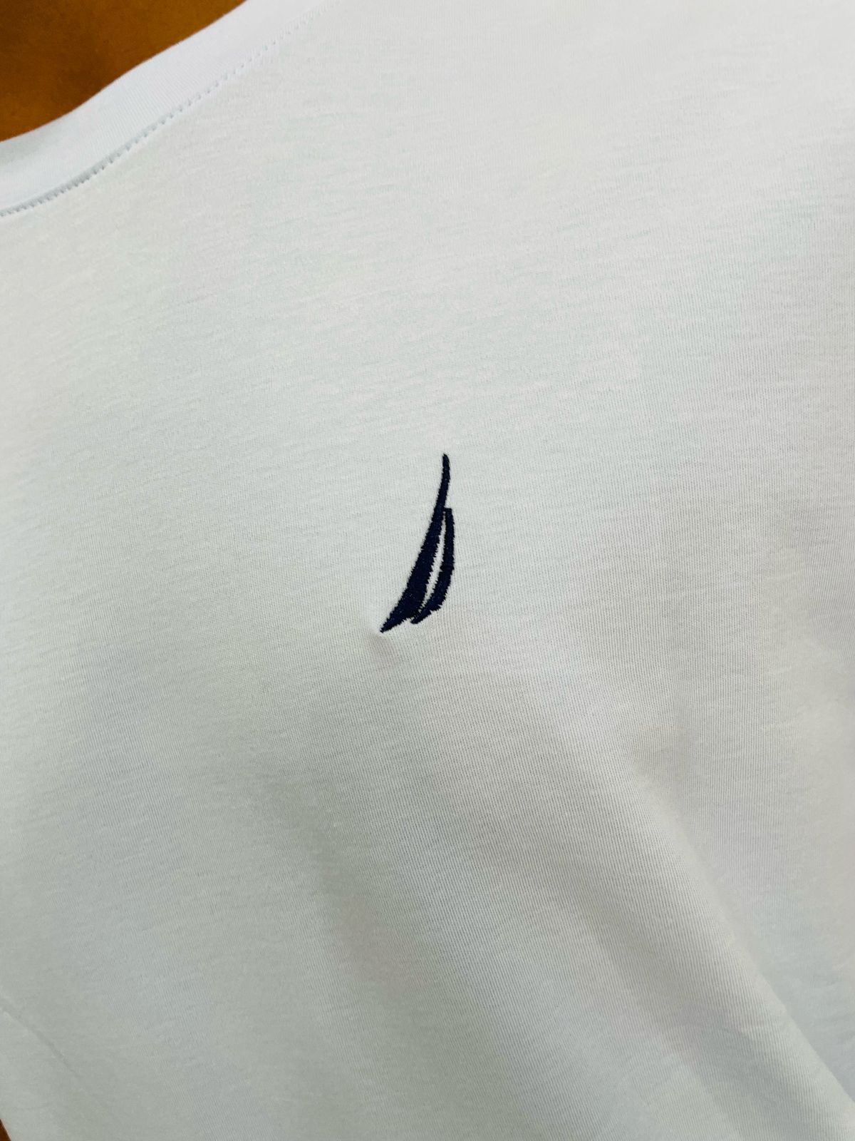 Polo Nautica celeste / Logo negro